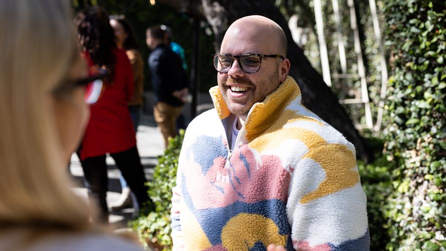 Man in a colourful jumper