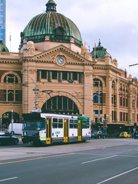 Melbourne city in front of the train station with a tram